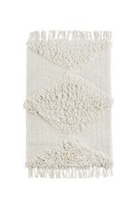 Tapis blanc épais tufté Madam Stoltz